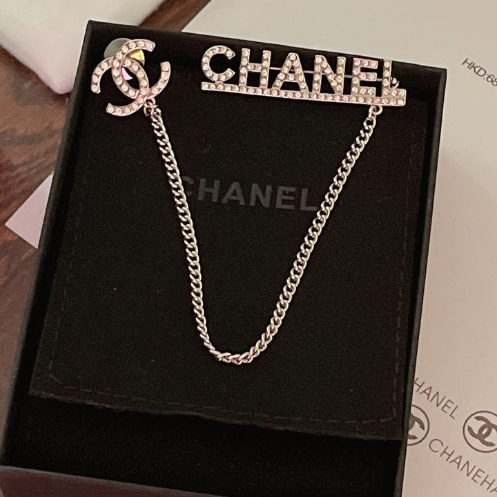 Classic CC rhinestone letters hanging chain brooch