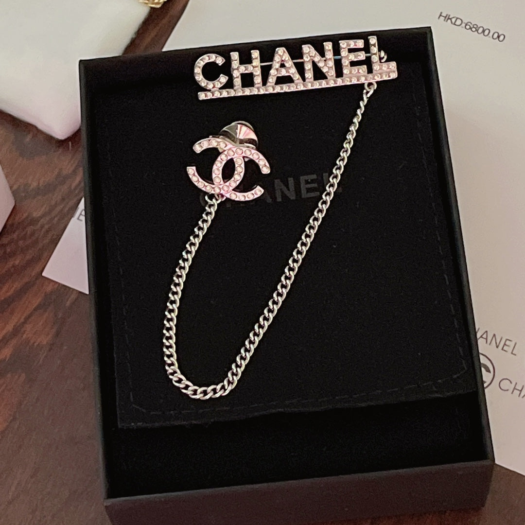 Classic CC rhinestone letters hanging chain brooch