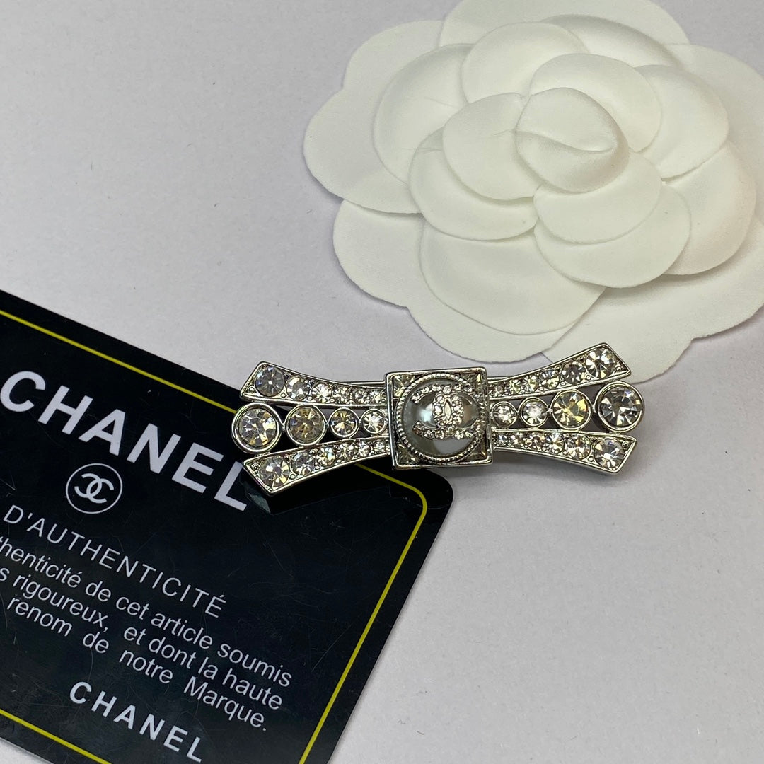 Fashion CC rhinestone bow brooch