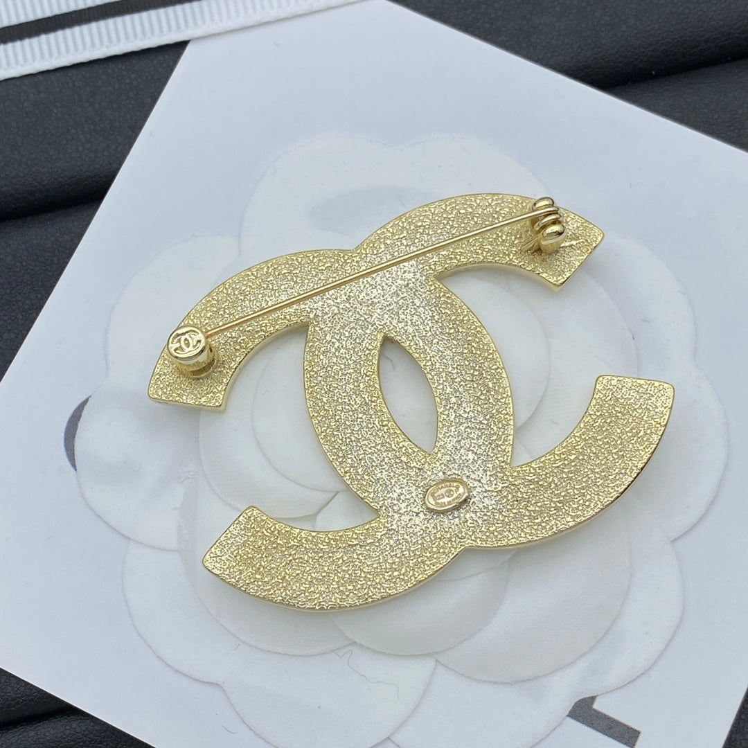 Classic CC brooch