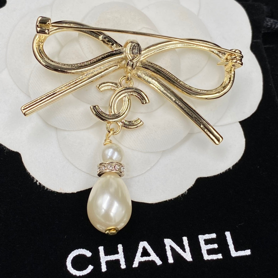 Fashion bow pearl brooch