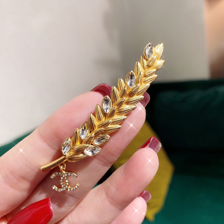 Fashion Golden Feather Inlay Brooch